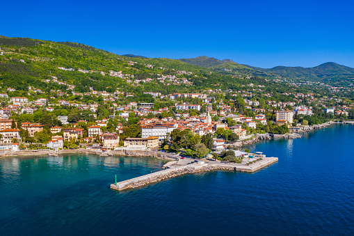 Croatia, beautiful town of Lovran and Lungomare sea walkway, aerial panoramic view in Kvarner bay