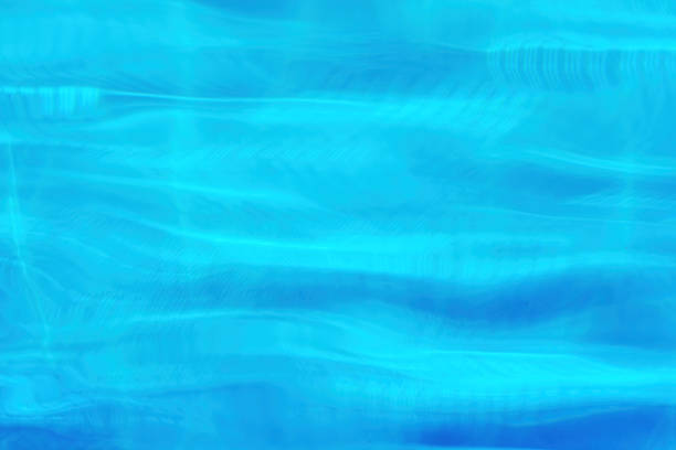 istock Blue water waves in the swimming pool. Background texture pattern 1222925820