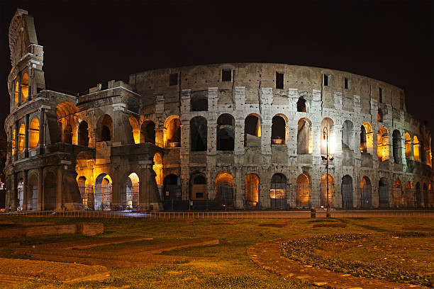 Coliseum at night stock photo