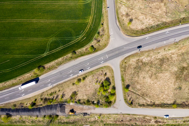 istock An Aerial Road Trip - forest with curved road 1222929617