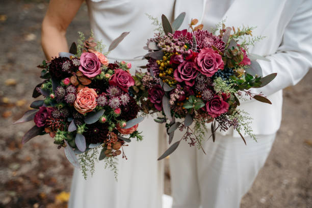 istock Two brides holding their wedding bouquets 1222929639
