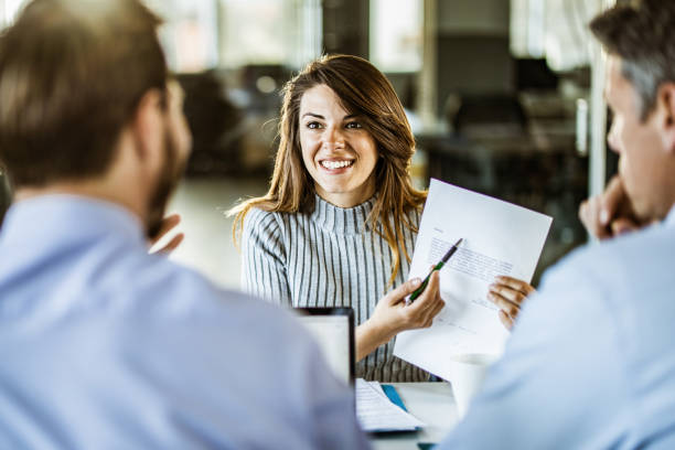 istock Happy female candidate talking about her resume on a job interview. 1222930503