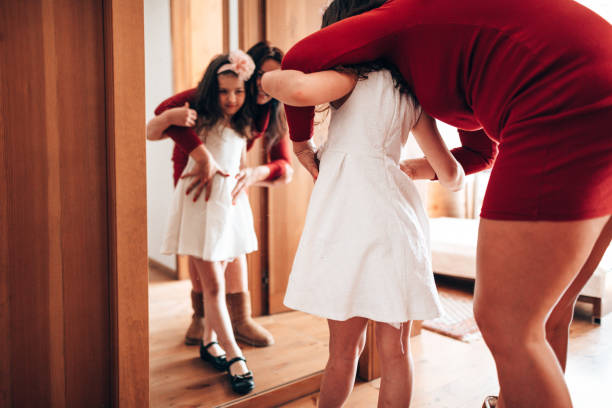 istock get dressing in front of the mirror 1222930814