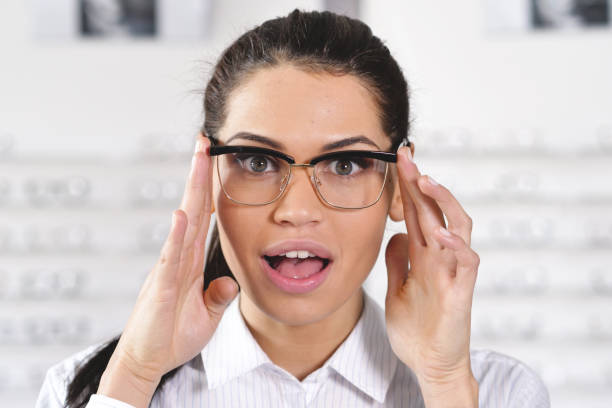 istock An ophthalmologist doing a visual examination for a customer at an optical center. 1222931140