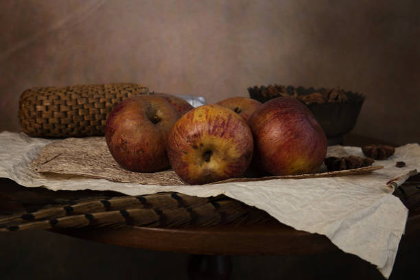 istock Objects on the table is an ancient vase of flowers, fruit, wine glass 1222931823