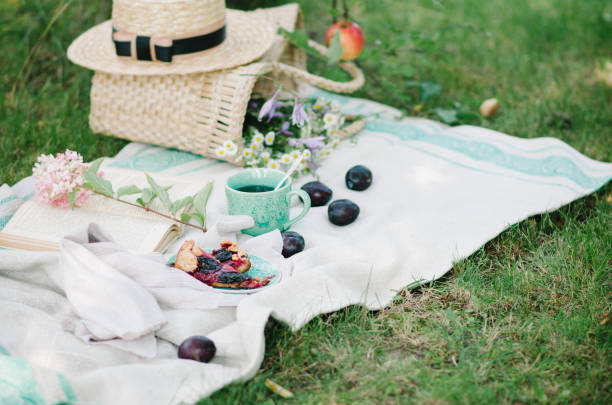 istock Picnic wicker basket with food on on the grass. Picnic concept. 1222932013