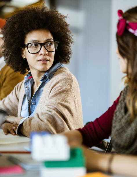 istock Creative women talking on a meeting in the office. 1222932367