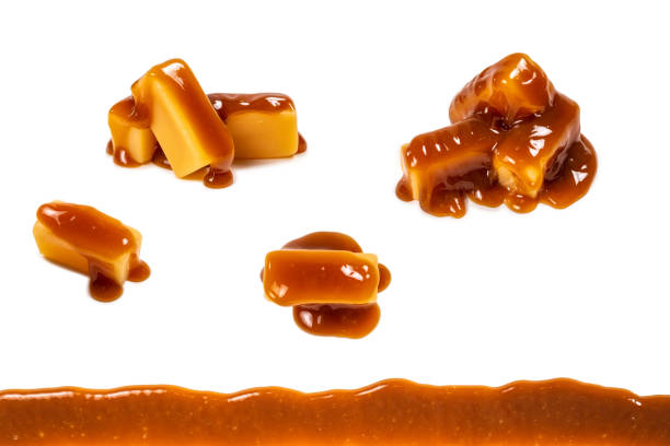 istock Tasty caramel candy isolated on white background. 1222933919