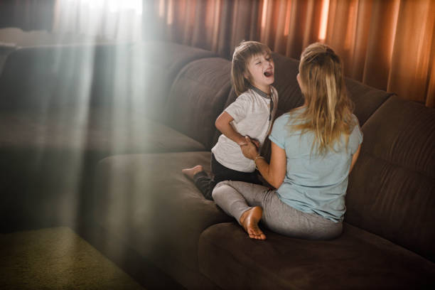 istock Happy boy shouting on his single mother at home. 1222935338