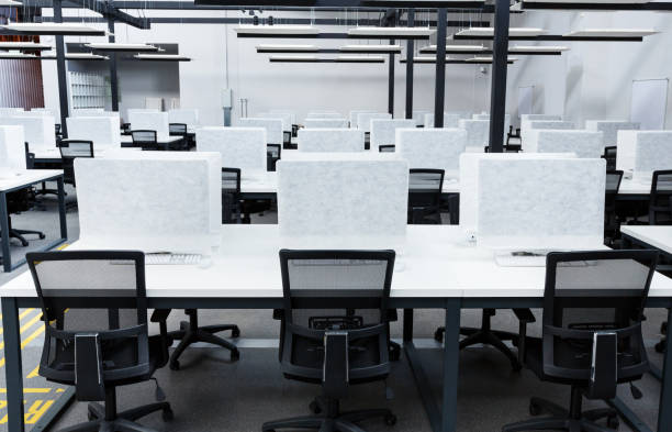 istock Close up of empty places for workers in co-working 1222935412