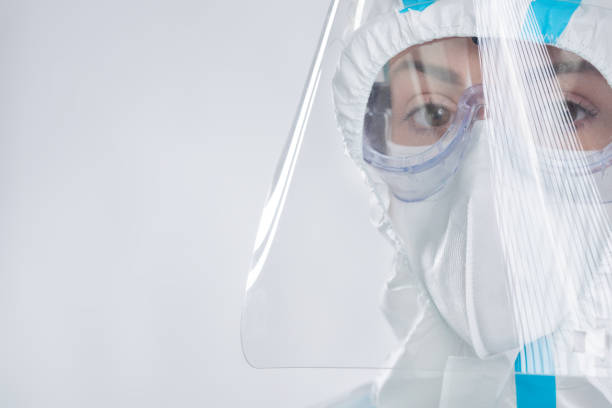 istock Female doctor in protective coronavirus suit 1222937647
