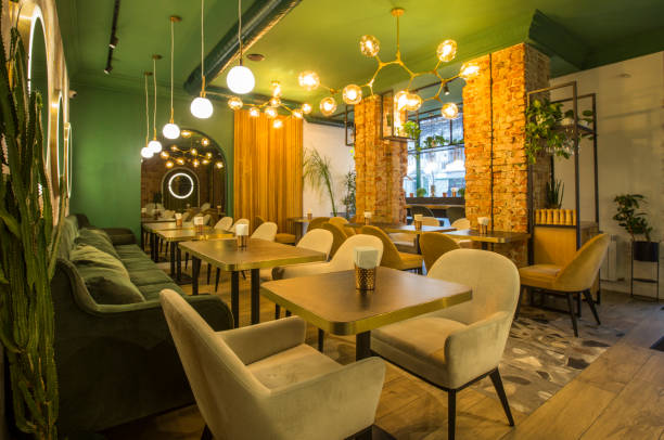 istock Restaurant in modern style, light colors interior with green walls 1222939305