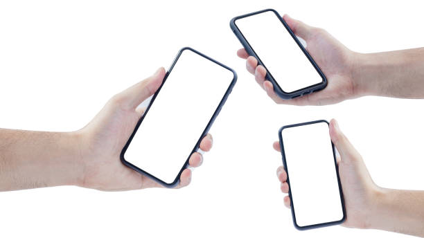 istock Hand holding the smartphone black color￼ with white screen ,isolated on white background￼ 1222940402