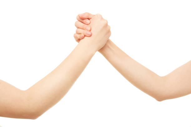 istock Man and woman arm wrestling 1222941096