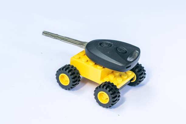 istock CAR KEY AND A TOY CAR 1222942819
