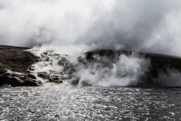 Horizontal view of a geyser near firehole River at Yellowstone National Park