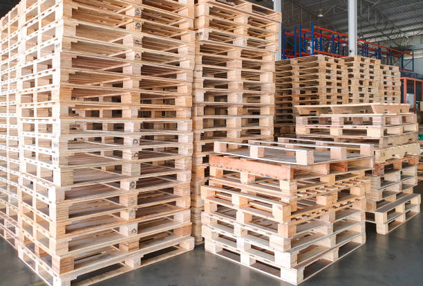 istock stack of wooden pallet in warehouse storage 1222953987