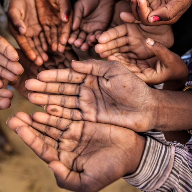 istock Poor Indian children asking for help, India 1222954054