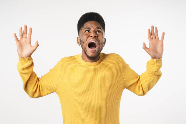 istock African american man terrified in panic shouting isolated over white background 1222955984