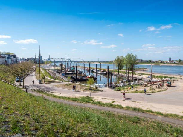 istock Steel arch bridge with small harbor 1222956618