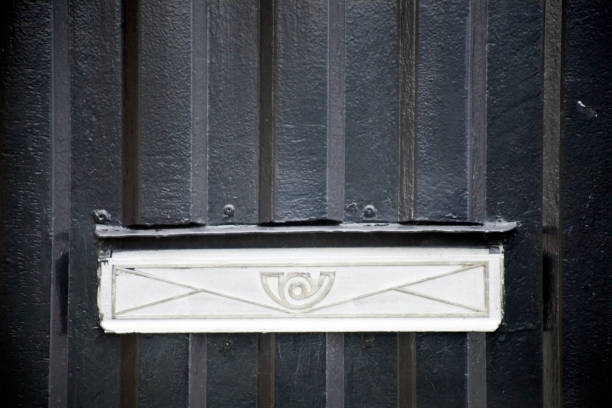 Close-up view of mail box on metal old door,  Galicia, Spain. Copy space on the upper part of the image.