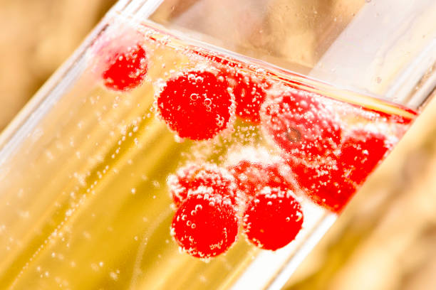 istock red fruits in sparkling champagne 1222960061