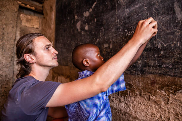 istock Volunteer Teaching in Africa, orphanage in Kenya 1222961084