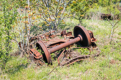 Rusty and abandoned train wheels in the countryside