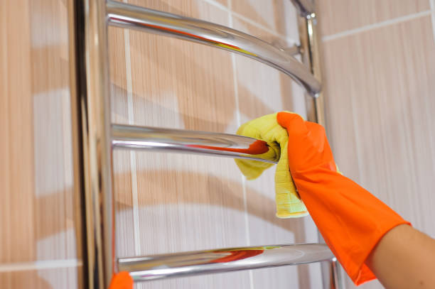 istock A woman washer is cleaning tiled surface in bathroom. 1222963467