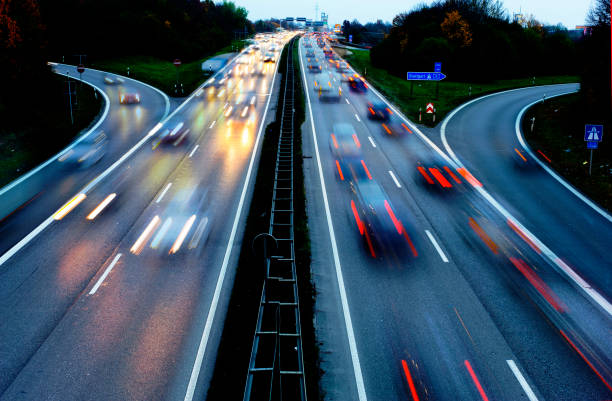 istock car traffic at night on the street 1222964093