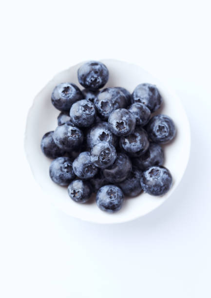 istock Bilberries isolated on white background. Concept for healthy nutrition. Top view. Copy space. 1222965740