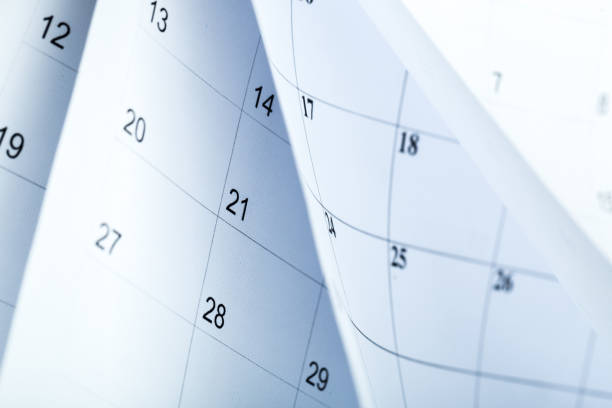 istock Closes a calendar 2020 page in blue. flipping calendar 1222965862