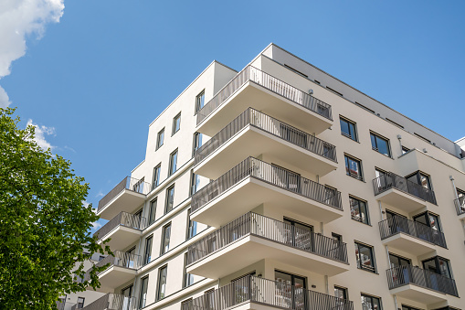 Modern apartment building in Berlin Germany. The architecture of the house is very modern with clean lines and elegant design features.