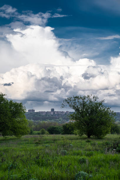 istock sky after rain with huge clouds. city skyline. 1222974270