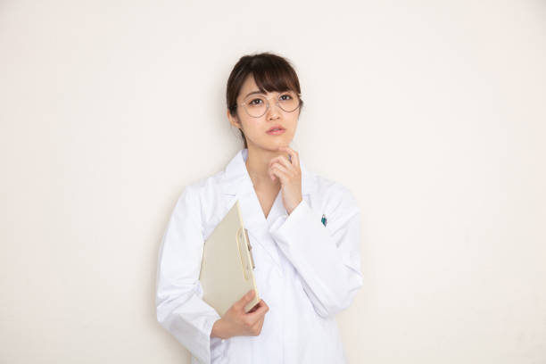 istock Woman in white coat 1222976188