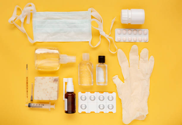 istock Medical supplies on yellow background 1222976285