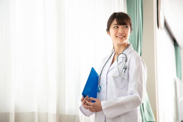 istock Woman in white coat 1222976833