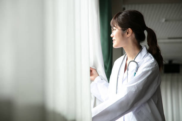 istock Woman in white coat 1222976876