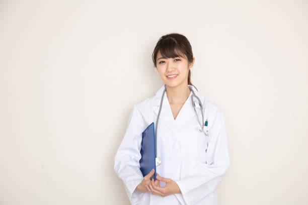 istock Woman in white coat 1222977131