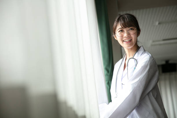 istock Woman in white coat 1222977550