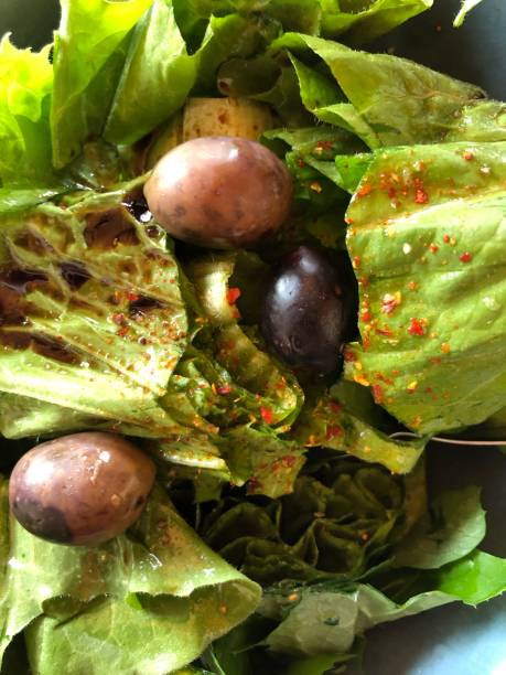 istock green salad and olives in spring 1222977673