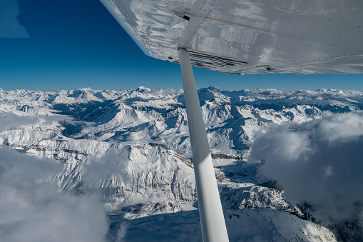 Flying over the Alps in winter