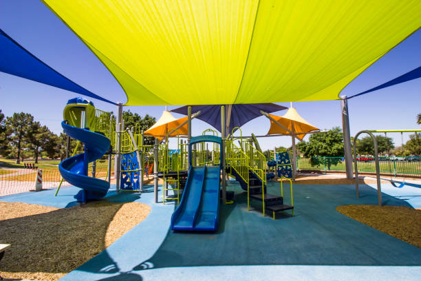 istock Children's Playground Equipment Covered By Canopies 1222984274