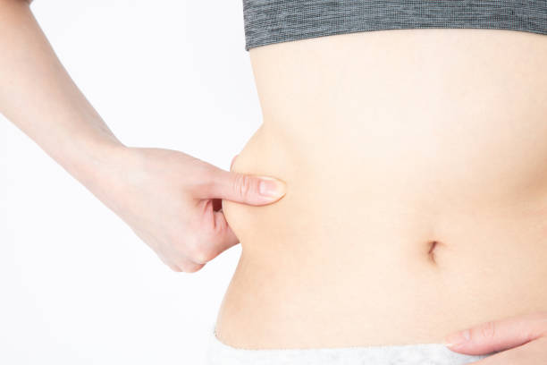istock Diet image. Female belly and waist. 1222984832