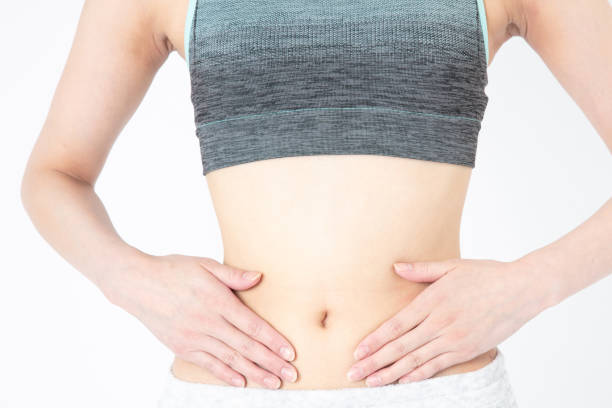 istock Diet image. Female belly and waist. 1222984858