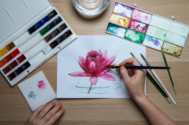 istock Mockup of the artist's desktop with brushes and paints 1222988829