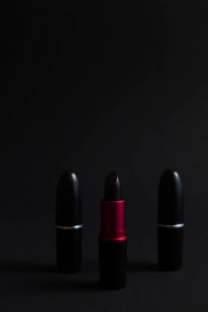 istock red lipstick on a dark background, lipstick, decorative cosmetics 1222989336