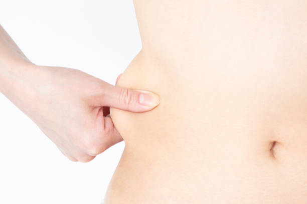 istock Diet image. Female belly and waist. 1222989421