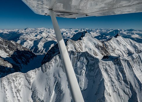 Flying over the Alps in winter