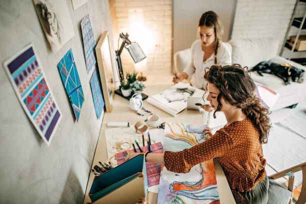 istock Young woman sketching on paper 1222992280